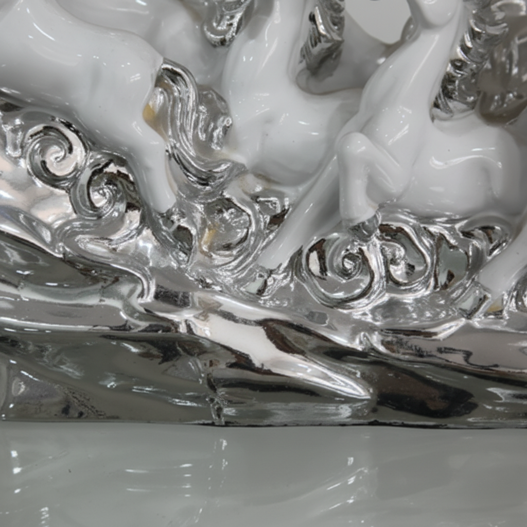 Ornate silver scrollwork floral base close up