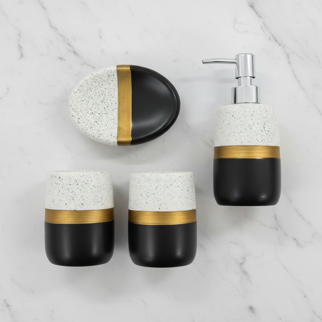 4-piece ceramic bathroom set black white speckled gold band - flat lay top view