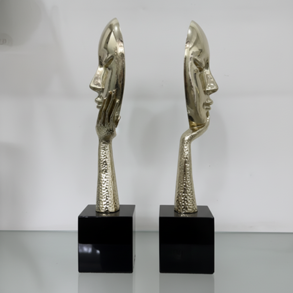 Gold face mask sculpture pair side profile full height